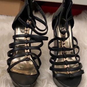 Chic Black Strappy Heels with Gold Accents